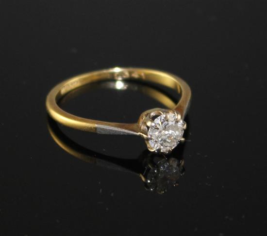 An 18ct and Pt. solitaire diamond ring, size R, gross weight 2.2 grams,